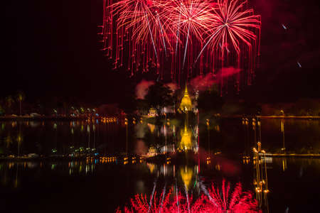 Light show in Buddha Statue at Temple in Sukhothai Historical park , Thailandの写真素材