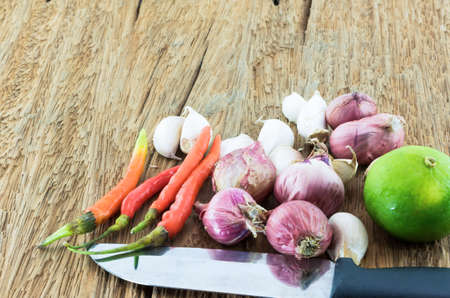 Combine soup spicy herbs Thai Food Tom Yum on wooden tablesの写真素材