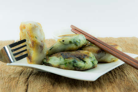 Chinese leek steamed dessert on wooden table