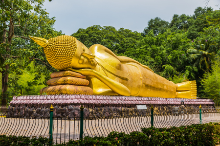 A reclining Buddha statue at Watcharkyai in Chanthaburi, Thailand.  are public domain or treasure of Buddhismの写真素材