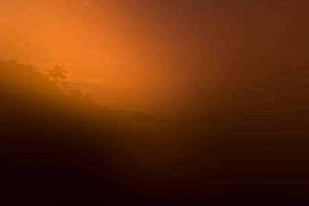 Natural Sunrise Over on sea. Bright Dramatic Sky And Dark Ground. Countryside Landscape Under Scenic...