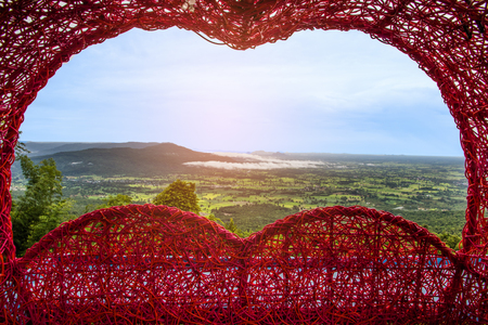 Wonderful summer scene with mountain range in the morning mist.の写真素材