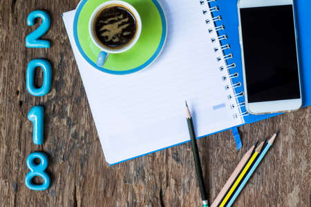 concept coffee for 2018. happy new year 2018. coffee 2018 year on old wooden backgroundの写真素材