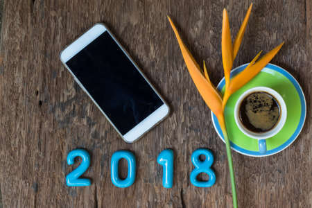 concept coffee for 2018. happy new year 2018. coffee 2018 year on old wooden backgroundの写真素材