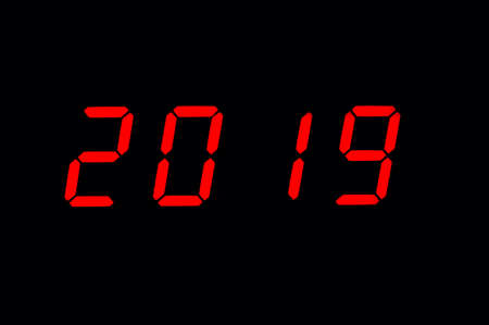 The electronic clock shows the upcoming new year 2019の写真素材