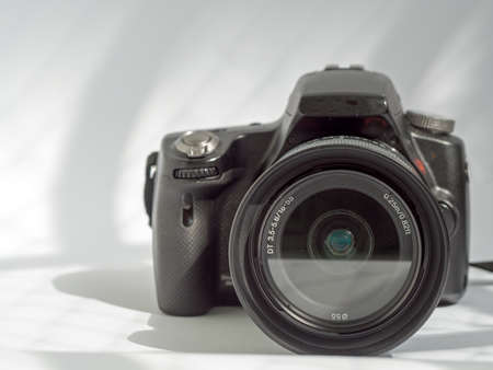 digital single lens reflex camera on white