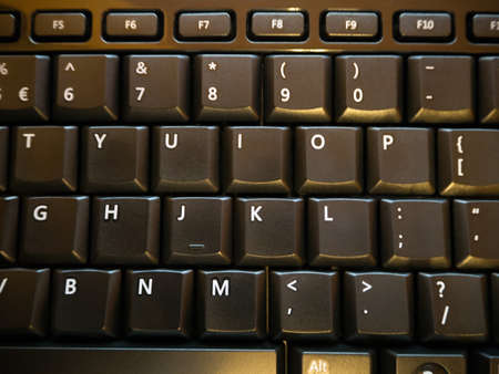 IT workplace, computer keyboard, desktopの写真素材