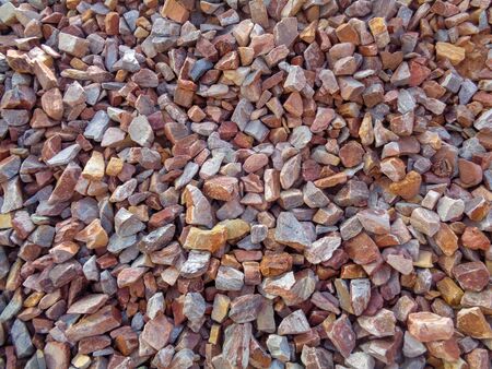 Colored gravel stones background for construction industryの写真素材