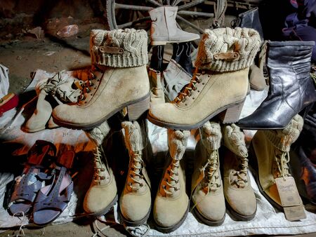 Ladies boots sell at street racked up and downの写真素材