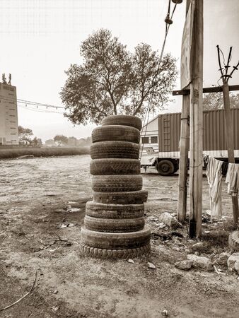 Stacked tyre at road side tyre change or service shopの写真素材