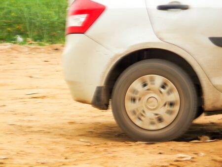 Side view of running car in high speed with motion blurの写真素材