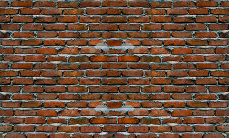 Old Brick wall uneven texture. Grunge red vintage backgroundの写真素材