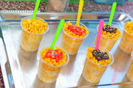 Boil Corn Topped with chocolate and  Strawberry の写真素材