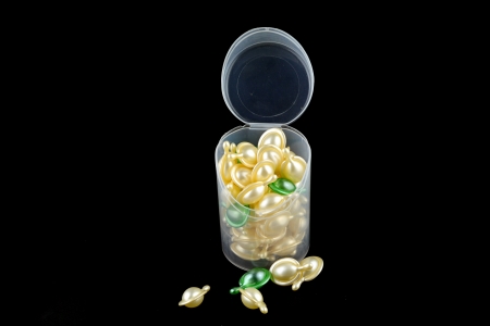 vitamin for hair spa isolated on black backgroundの写真素材