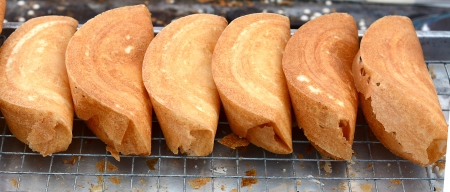 Coconut dessert on a wire rackの写真素材