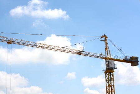 Construction site with crane over a buildingの写真素材