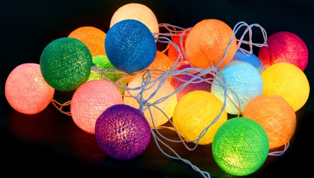 colourful lamps isolated on black backgroundの写真素材