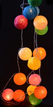 colourful lamps isolated on black backgroundの写真素材