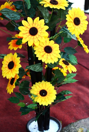 Plastic decorative sunflower sales during festive season. の写真素材