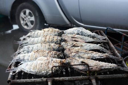 Roasted tilapia fish on grill. の写真素材