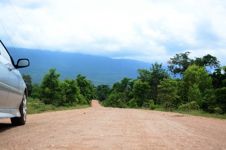 empty road in jungle of thailandの写真素材