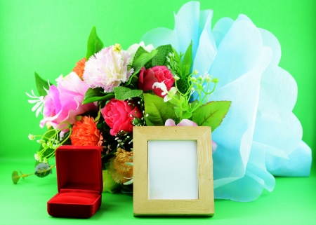 photoframe flower and red ringboxの写真素材
