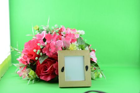 photo frame and flowersの写真素材