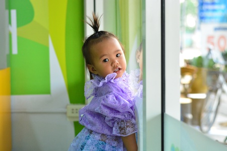 asian baby girl wearing thai dressの写真素材