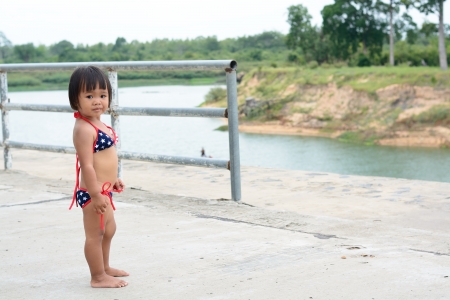 asian baby girl wear america bikiniの写真素材