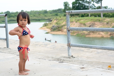asian baby girl wear america bikiniの写真素材