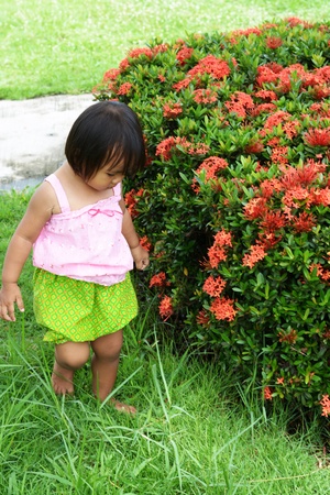 Portrait of funny little Asian girl の写真素材