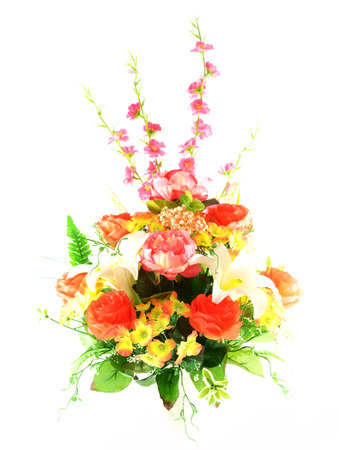 Multicolored flowers in a vase, isolated on white background の写真素材