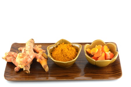 Turmeric roots and powder の写真素材