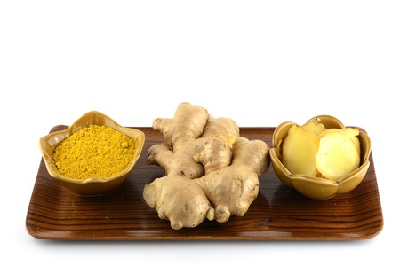 Ginger powdered on whiteの写真素材