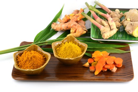 Turmeric roots and powder の写真素材