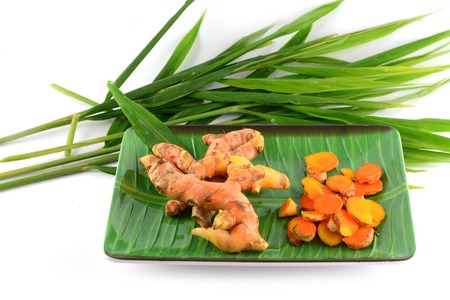 Turmeric roots with leafの写真素材