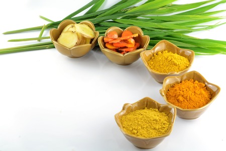 Turmeric roots and powder の写真素材