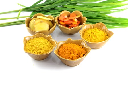 Turmeric roots and powder の写真素材