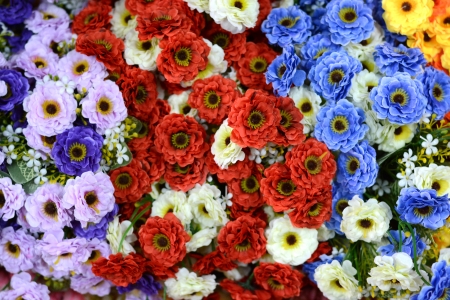 beautiful colors of plastic flowers の写真素材