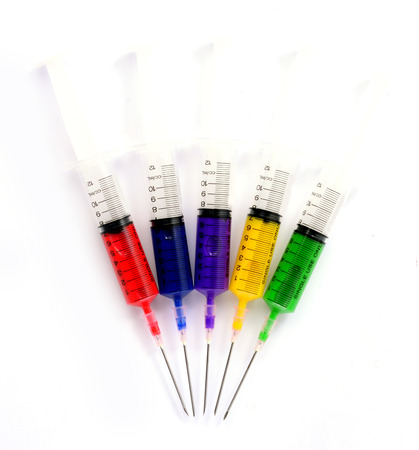 Syringe filled with colors.の写真素材