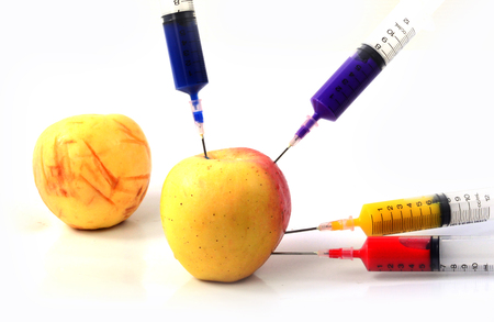 Apple and syringes isolatedの写真素材