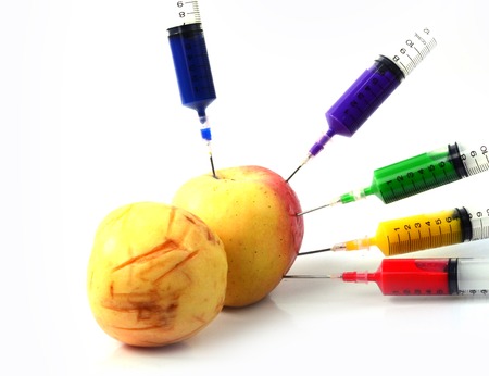 Apple and syringes isolatedの写真素材