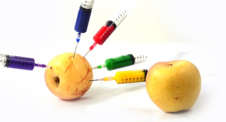 Apple and syringes isolatedの写真素材