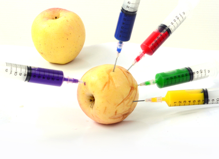 Apple and syringes isolatedの写真素材