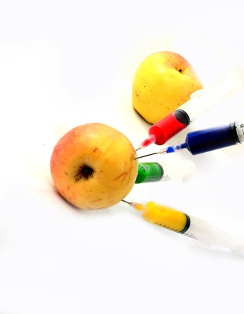 Apple and syringes isolatedの写真素材