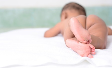 Close up of newborn baby feet の写真素材