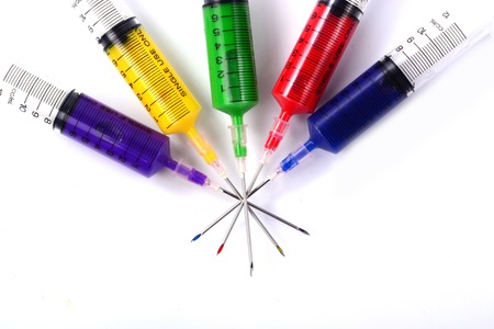 Syringe filled with colors.の写真素材