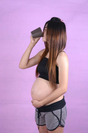 Portrait of the young pregnant woman の写真素材