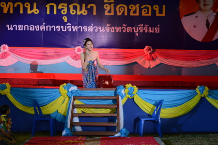 BURIRAM - October 13: Unidentified Contest Show talent homosexuals Contest of Long boat racing 2013 final on October 13, 2013 at the Satuk Buriram, Thailandのeditorial素材