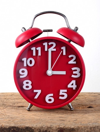 red alarm clock, showing timeの写真素材